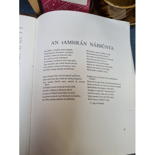 306 - A 1916-1966 commemorative Oidhreacht Irish language booklet. with English translation. Includes phot... 