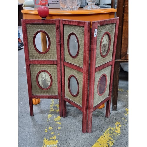 516 - A very interesting table screen in red velvet with frames to add images or photographs From the amaz... 