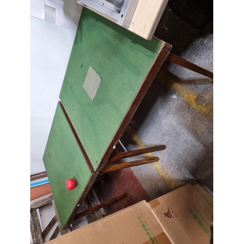 889 - A pair of vintage card / poker tables with wooden frames and topped with a baize lining and folding ... 