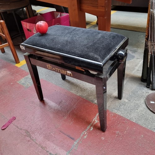 462 - A super black gloss Thomann branded high gloss adjustable piano stool with corduroy padded seat.