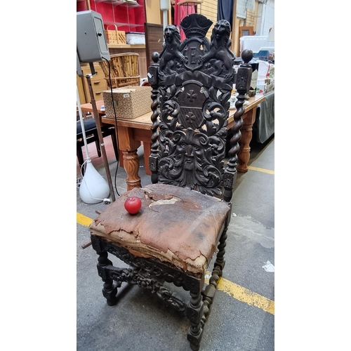 466 - Star lot : A fabulous Victorian heavily carved oak Jacobean revival chair. With fantastic barley twi... 