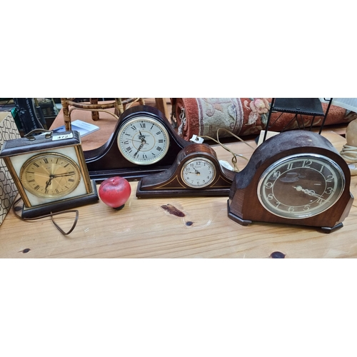 472 - Four vintage mantel clocks including two electric examples and two battery powered examples. The Smi... 