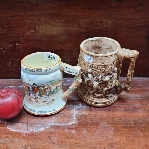 499 - Two vintage jugs including a Widdicombe Fair music example along with a John Peel pottery jug.