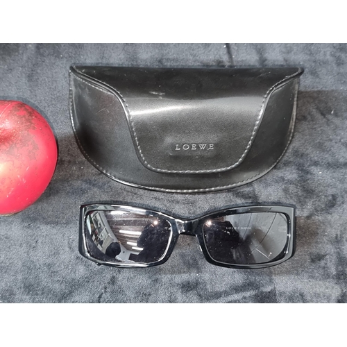 515 - A stunning pair of Loewe designer rectangular framed sunglasses. Similar for sale on Loewe website f... 