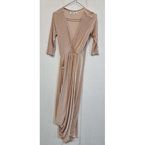 552 - A brand new classy wrap style nude dress in a women's UK size 6. Nice rouched detail to sides, with ... 