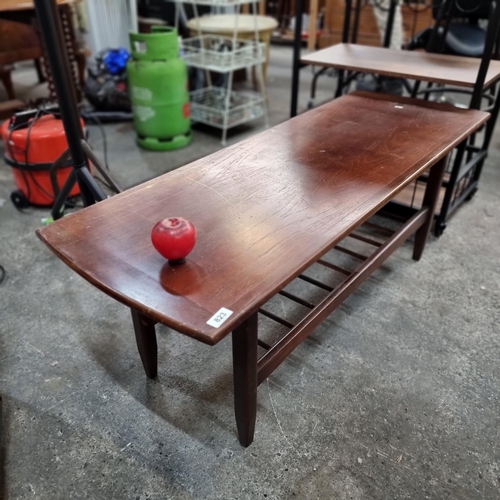 823 - Star Lot : A handsome large mid century Coffee table, With a jungle bars magazine rack below. It's a... 