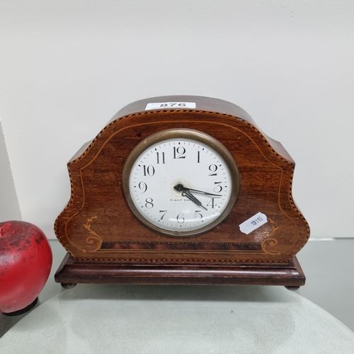 876 - A handsome Edwardian wind up mantle clock boasting beautiful intricate marquetery detail, an eight d... 