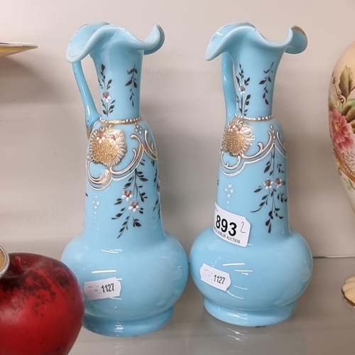 893 - A wonderful pair of hand painted Bohemian glass vases in a fabulous vibrant sky blue featuring flora... 