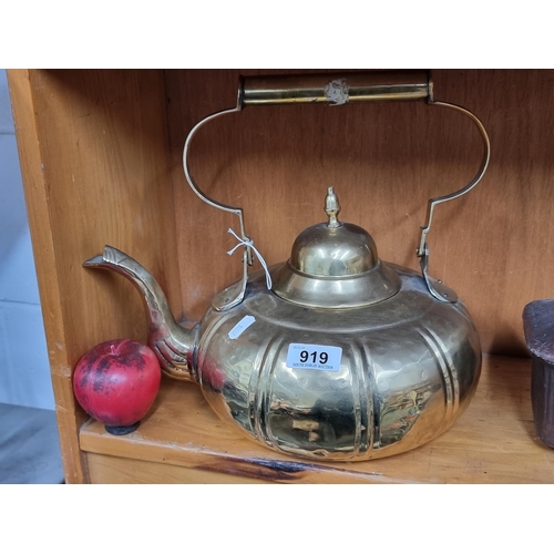 919 - A striking large brass kettle with swan neck spout. Great shape.