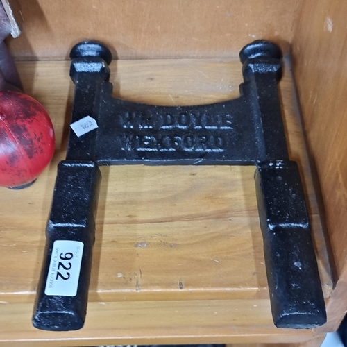 922 - A heavy cast iron boot scraper reading 'Wm Doyle Wexford'.