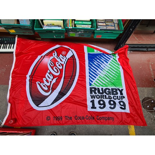 1010 - A striking large Coca Cola red flag from the 1991 Rugby World Cup.