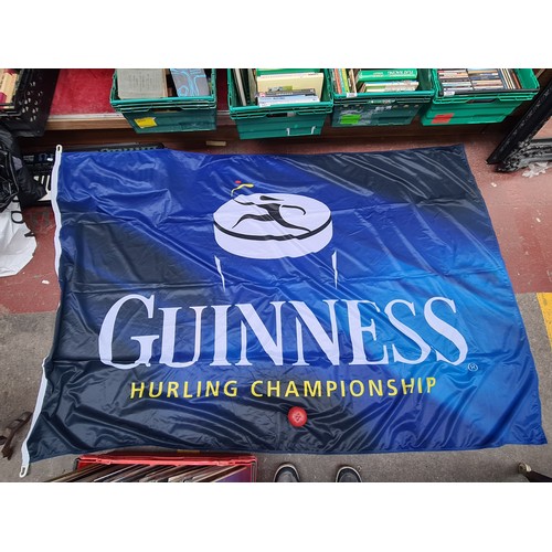 1011 - Two Guinness hurling championship flags from the early 2000's.