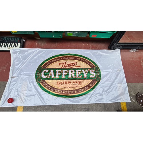 1012 - Two early 2000's beer flags including one for Caffery's red ale and one for Tenants lager.