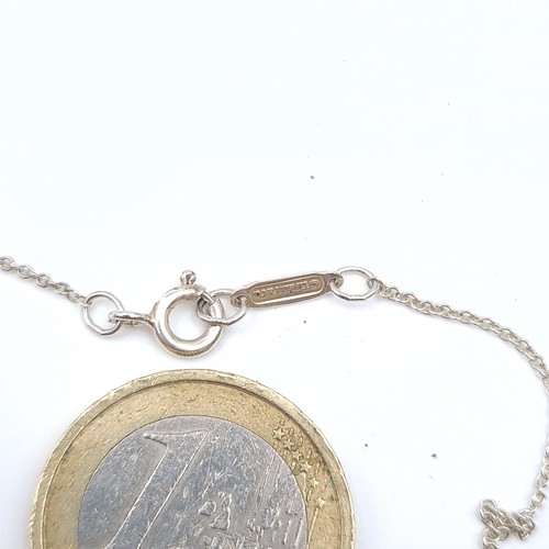 4 - An original sterling silver Tiffany & Co Newyork pendant and chain, length of chain, 40cm. Item come... 