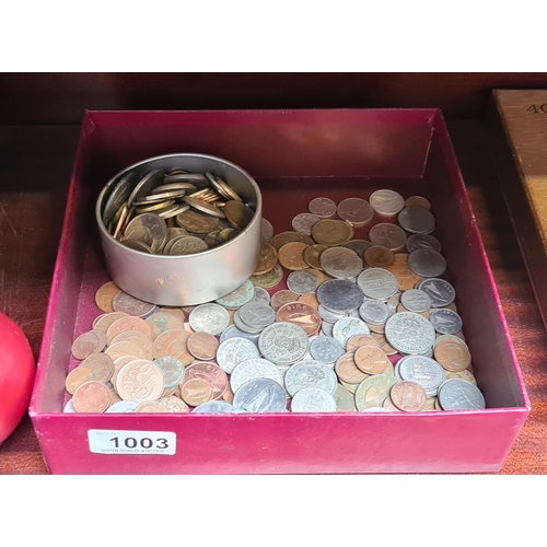 1003 - A box containing a large coinage unchecked.