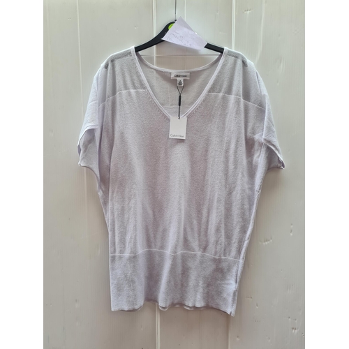 1015 - A brand new with tags Calvin Klein beautiful light grey summer top. Size UK Medium