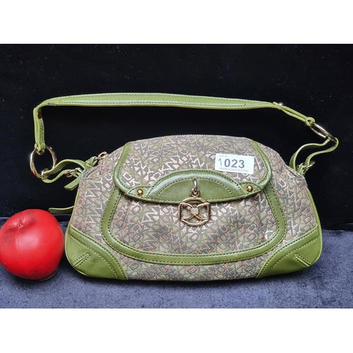 1023 - A stunning DKNY gold and emerald green small handbag.