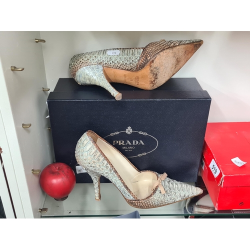 518 - Star Lot : An attractive pair of Prada Python snake skin designer heeled shoes in beautiful sky blue... 