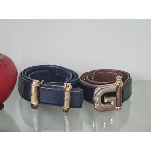 528 - Star Lot : Two genuine leather ladies Gucci belts in both navy & black. Newer models are currently r... 