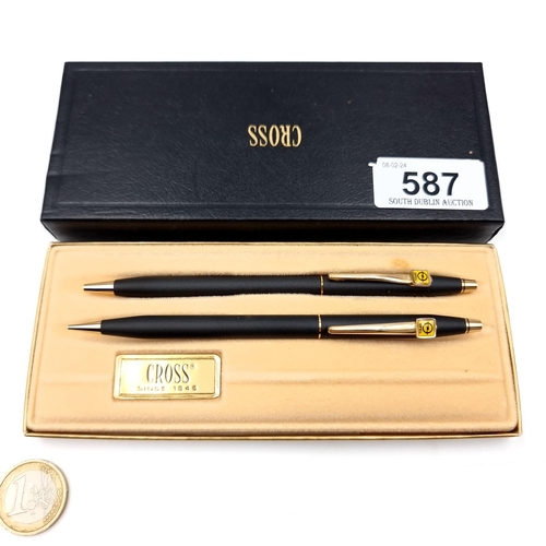 587 - A cross pen set consisting of a ball point and propelling pencil, in classic black with opel car ins... 