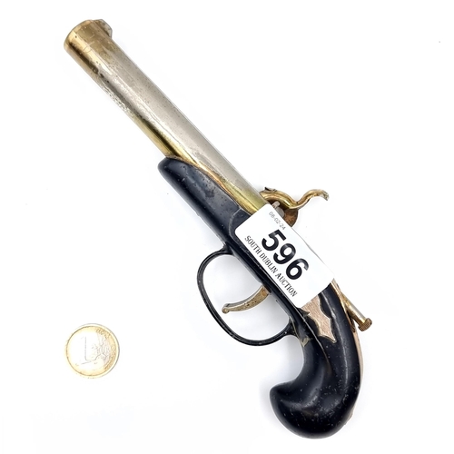 596 - A heavy reproduction antique flint lock pistol, length 20cm, weight 292 grams.