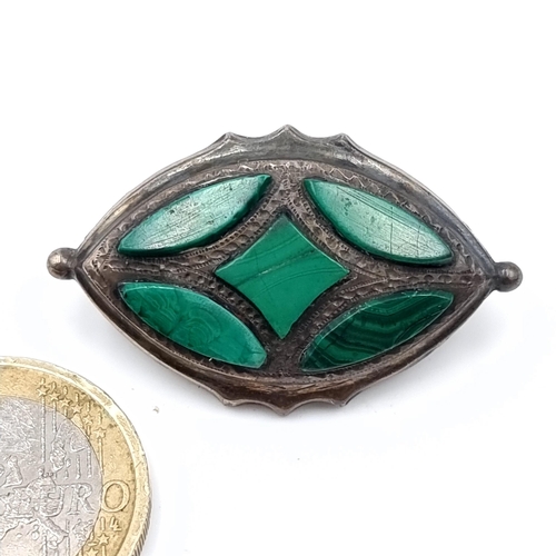 617 - A large antique Arts and crafts style sterling silver malachite brooch, length 3cm, pin intact.