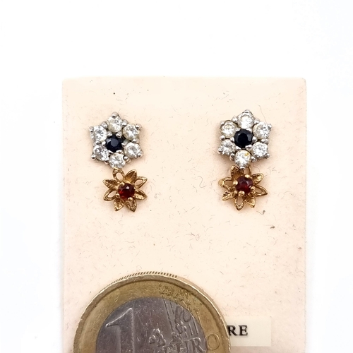 648 - Two pairs of 9K gold earrings including a sapphire and gemstone pair together with a garnet stone ex... 