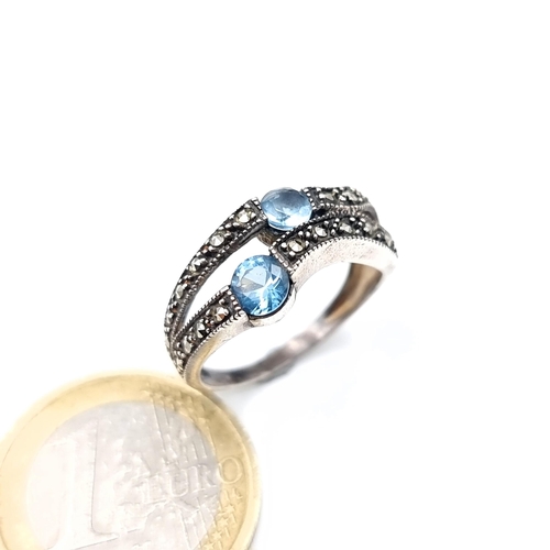 662 - An antique sterling silver two stone aquamarine ring set in marcasite, size M, weight 3.2 grams, box... 