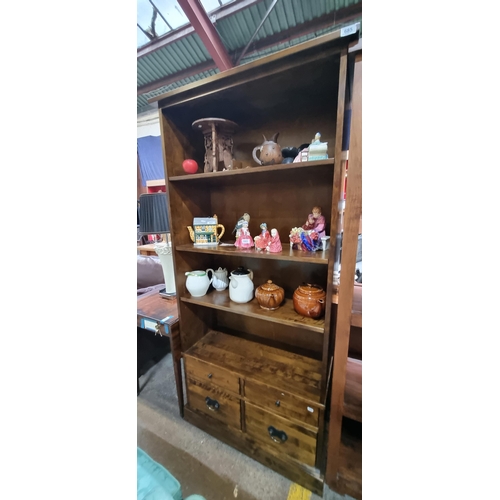 685 - Star Lot : A very handsome designer Laura Ashley bookcase crafted from honey gold birch, with four s... 