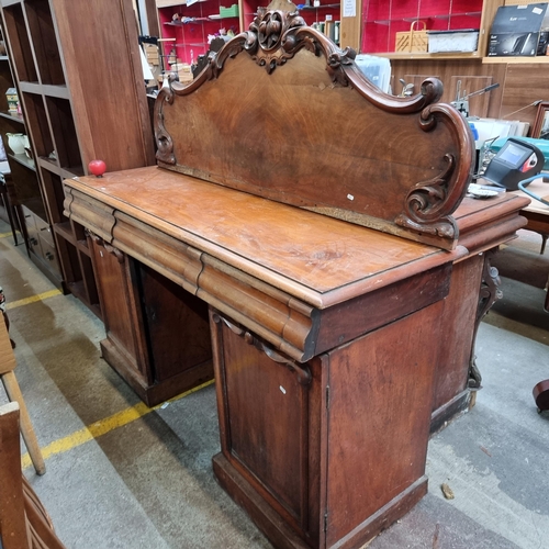 687 - Star Lot: A magnificent antique Victorian sideboard boasting fabulous carved scroll and leaf detail ... 