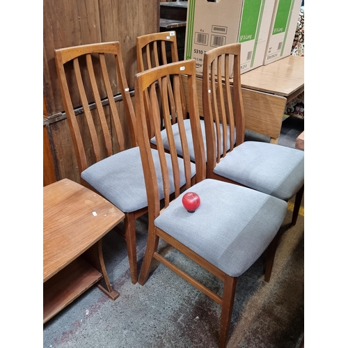 700 - A fabulous set of four vintage mid century modern teak dining chairs, in a G plan style with accompa... 