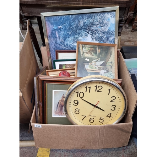 705 - A large box filled with a large number of high quality framed prints along with a wall clock.