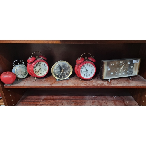 721 - Five retro alarm clocks including two bright red Jerger examples, a West Clox Big Ben Repeater, a Rh... 