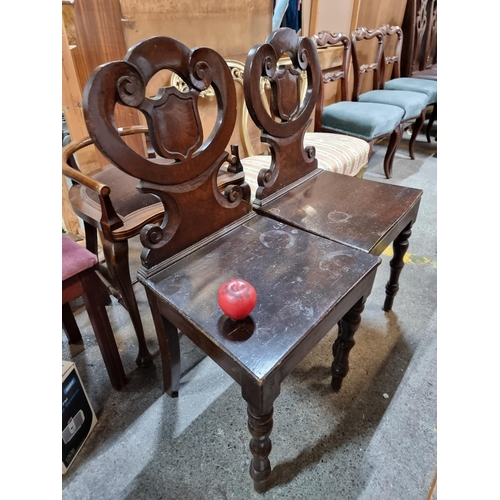 729 - A lovely pair of antique 19th century Victorian mahogany chairs with scroll and crest detail to back... 