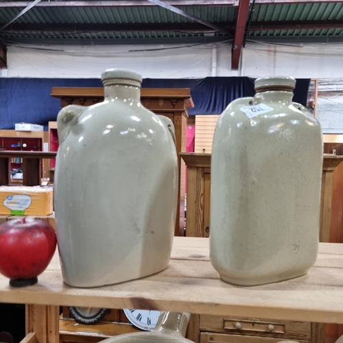 752 - Two Large antique Stoneware flat bottle with stoppers. In good order. Info vendor