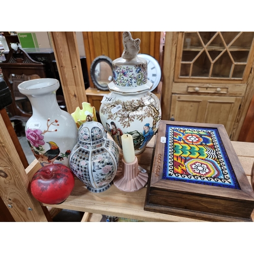 754 - An unusual Coca Cola Beaded box and three pretty vases.