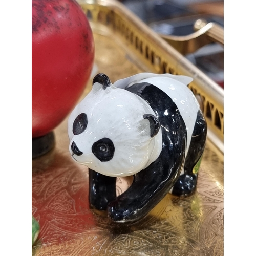 782 - An adorable Beswick figure of a charming panda.