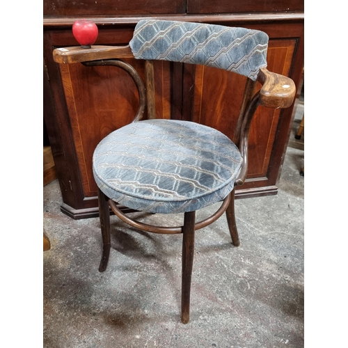 790 - A handsome antique bent wood bistro chair with upholstered seat and back rest.