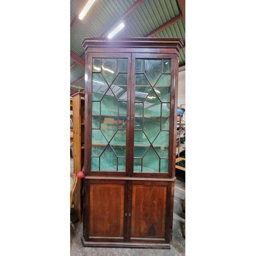 792 - Star Lot : A magnificent Jamaican Mahogany Georgian oak freestanding astra glazed two door corner ca... 