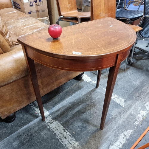 800 - A wonderful Edwardian demilune table boasting beautiful string inlay and tapered legs. From a very f... 