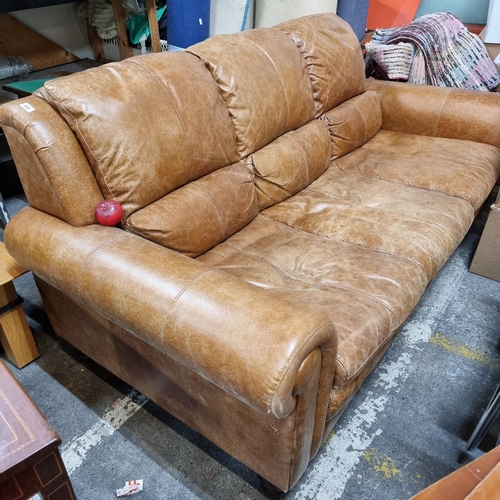 802 - Star Lot : A gorgeous large tan leather three seater sofa. In lovely condition. Beautiful Italian le... 