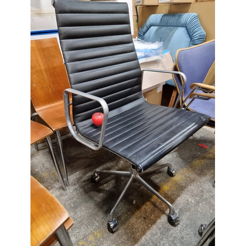 804 - Super Star Lot :  A stylish Charles Eames black leather rare High back office chair featuring a chro... 