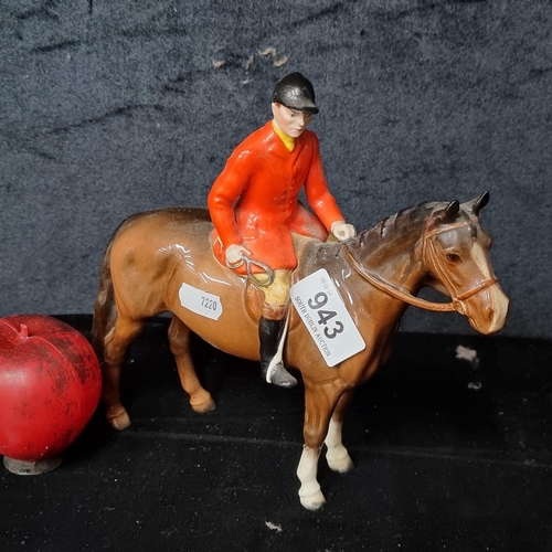 943 - A wonderful Beswick porcelain figure of a horse and jockey. In VGC