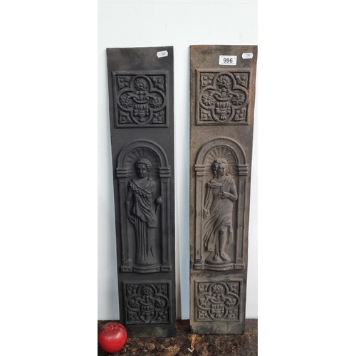 996 - A pair of heavy cast metal plaques of classical ladies, possible from a fireplace.