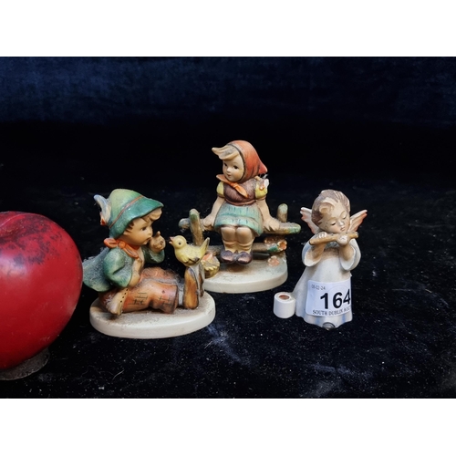 164 - Three lovely vintage Hummel figurines.