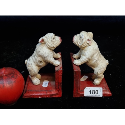 180 - A pair of heavy cast metal bulldog bookends.