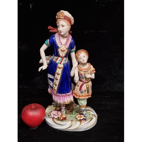 227 - A gorgeous antique large porcelain figure of a young women and her daughter. Fabulous quality to thi... 