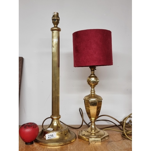 236 - Two vintage brass table lamps including a tall column shape example.