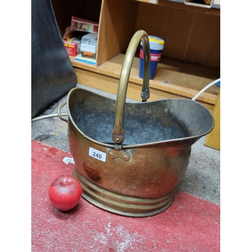 240 - A superb Victorian brass coal bucket.