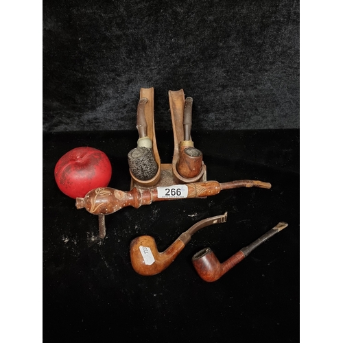 266 - A wonderful collection of six vintage pipes including three walnut examples.